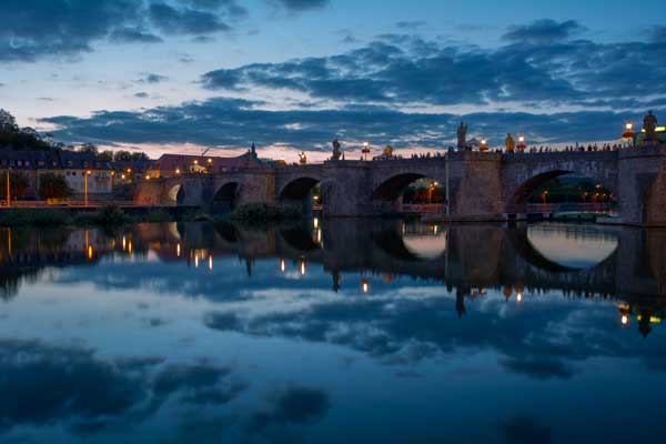 Old Bridge Embedded In Blue